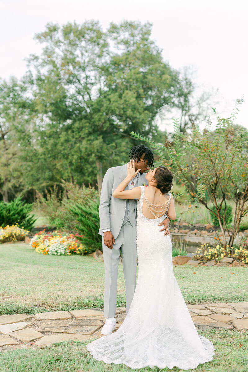 couple cuddling on wedding day