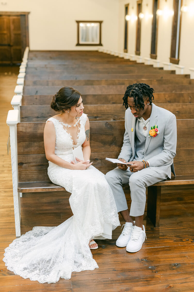 groom reading vows to bride