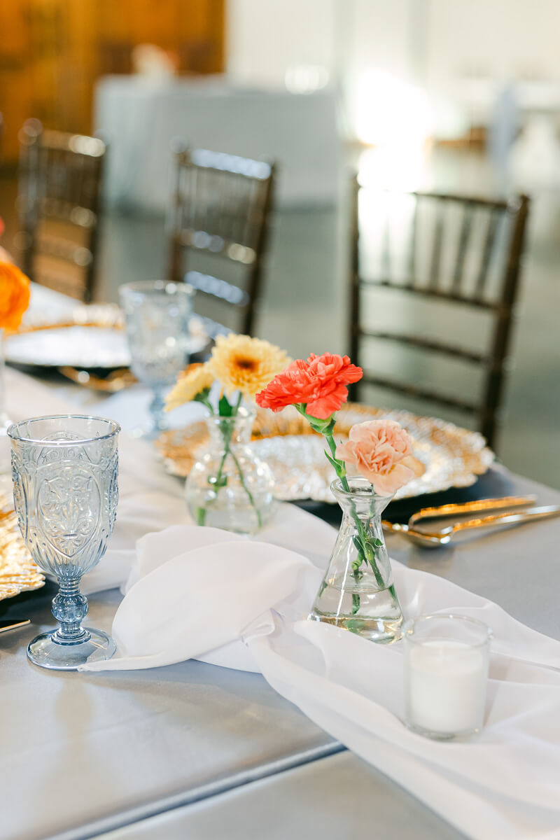 reception table details inside magnolia meadows wedding barn