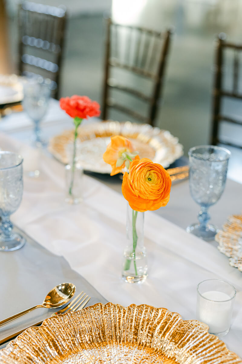 orange flower reception decor