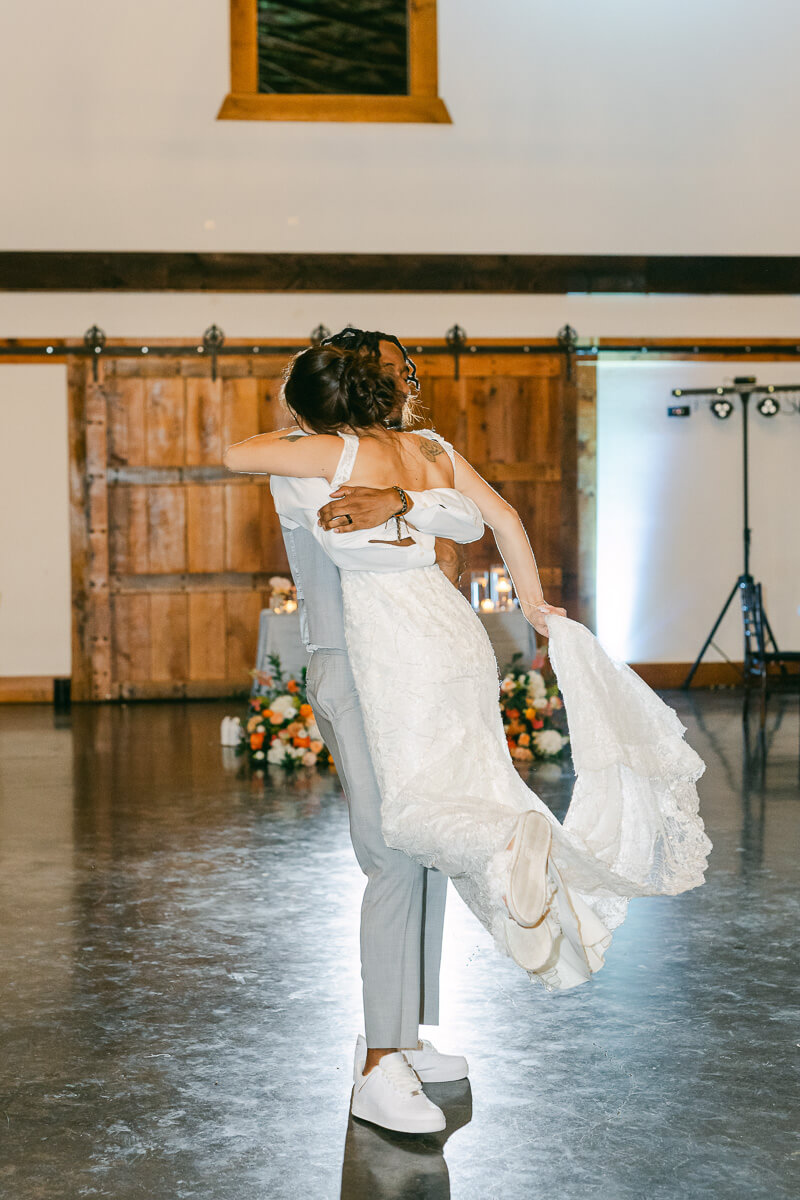 groom spinning bride during last dance