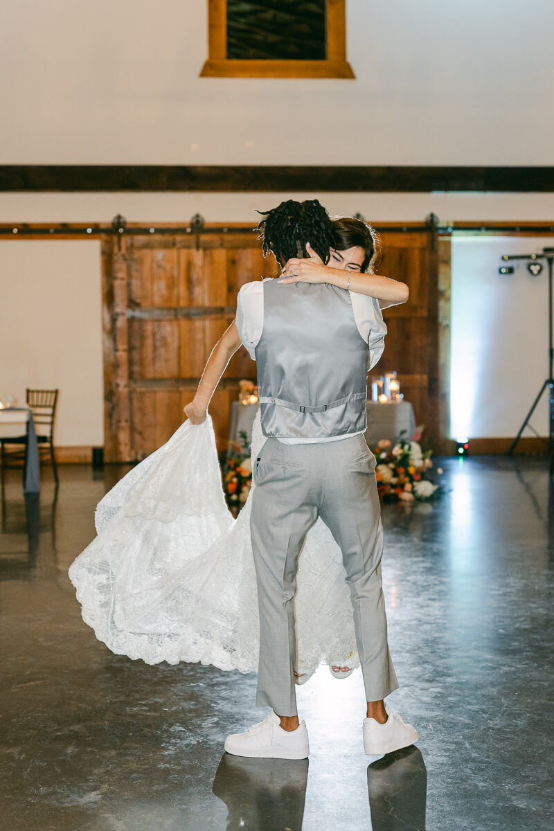 groom spinning bride during last dance