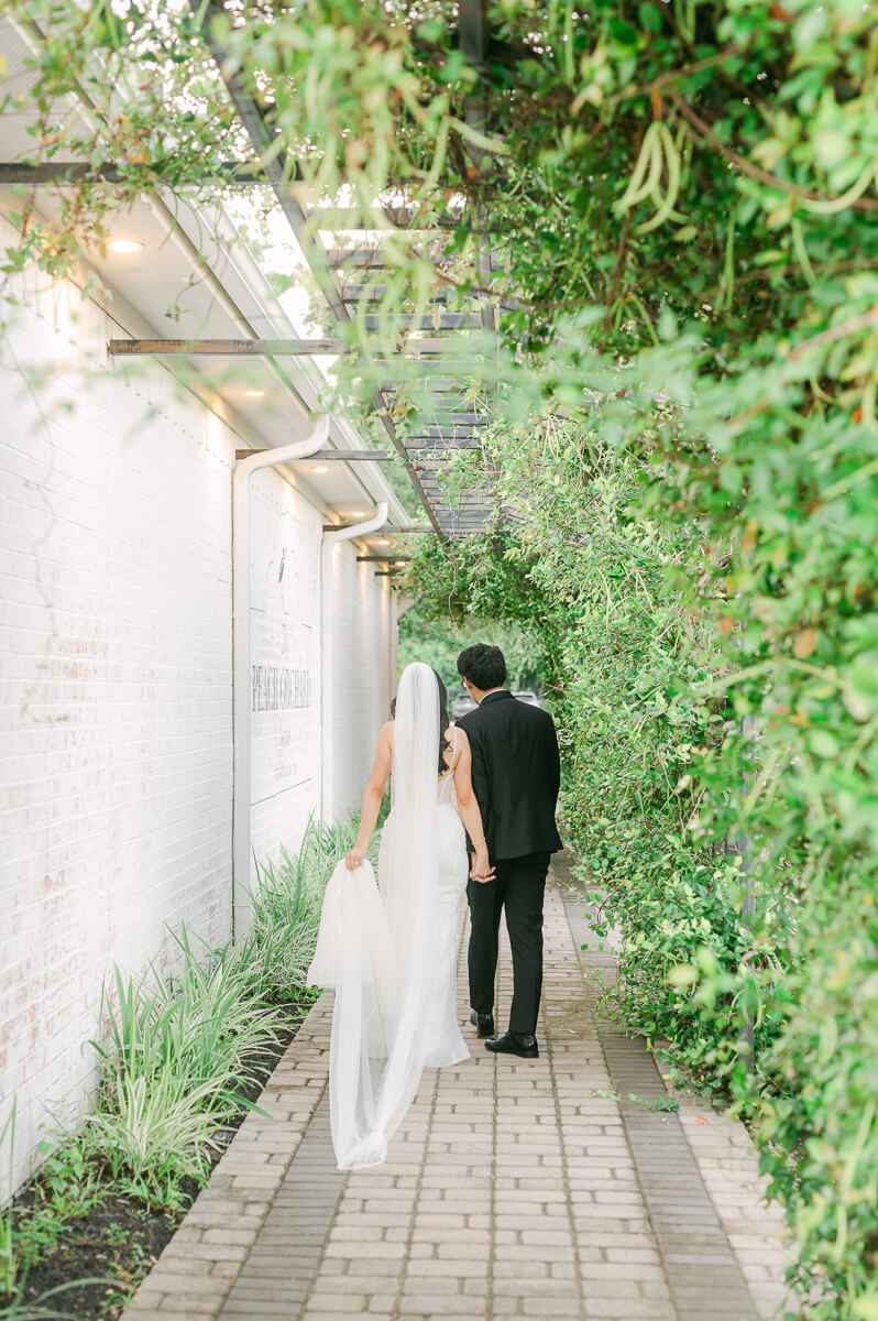 couple walking at The Peach Orchard wedding