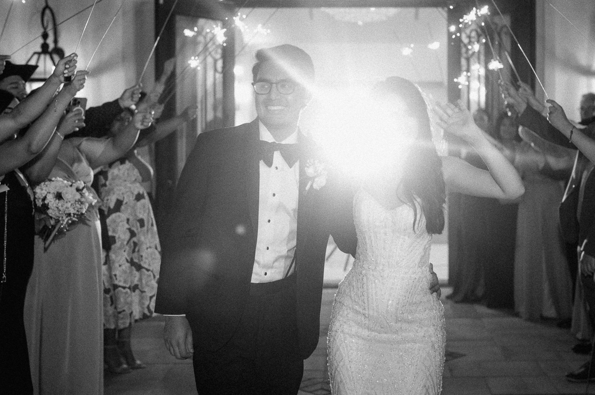 couple exiting their wedding at The Peach Orchard 