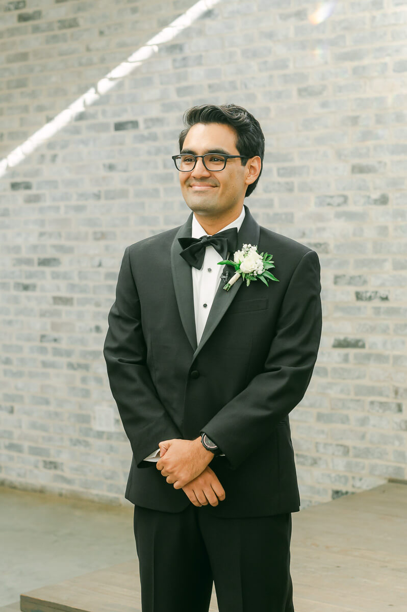 groom seeing his bride