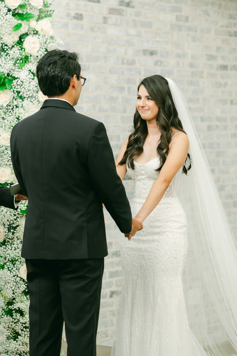 couple during their ceremony at The Peach Orchard 