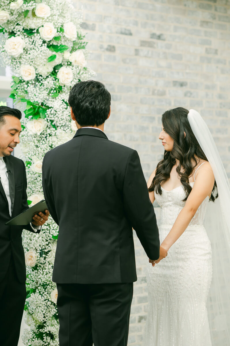 couple during their ceremony at The Peach Orchard wedding venue