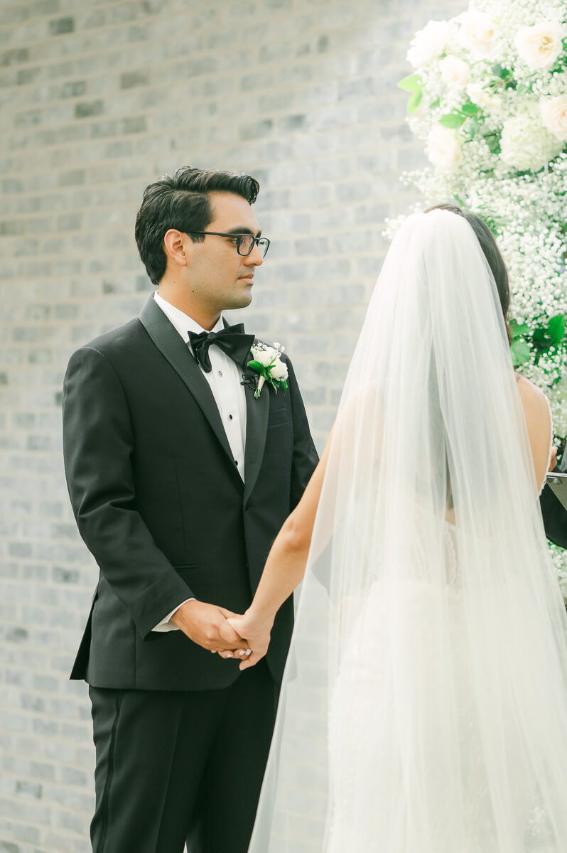 couple during their ceremony at The Peach Orchard by Houston photographer