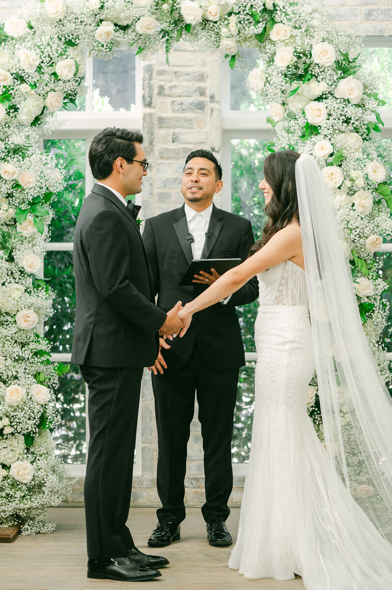 couple during their ceremony at The Peach Orchard by Houston photographer