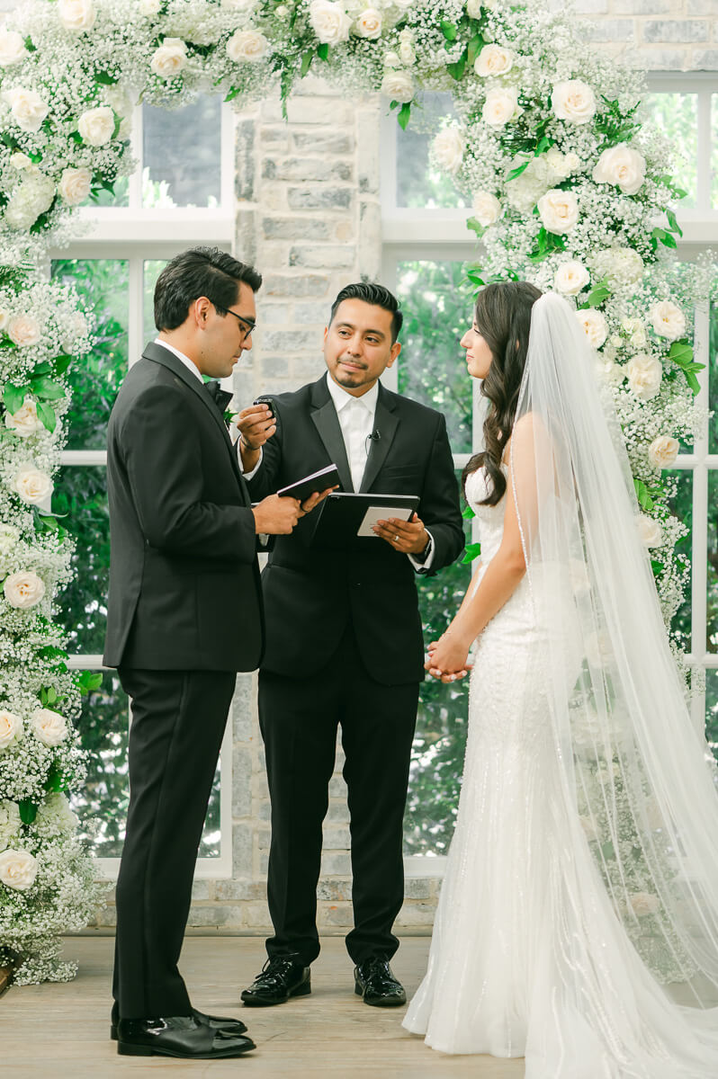 couple during their ceremony at The Peach Orchard by Houston photographer