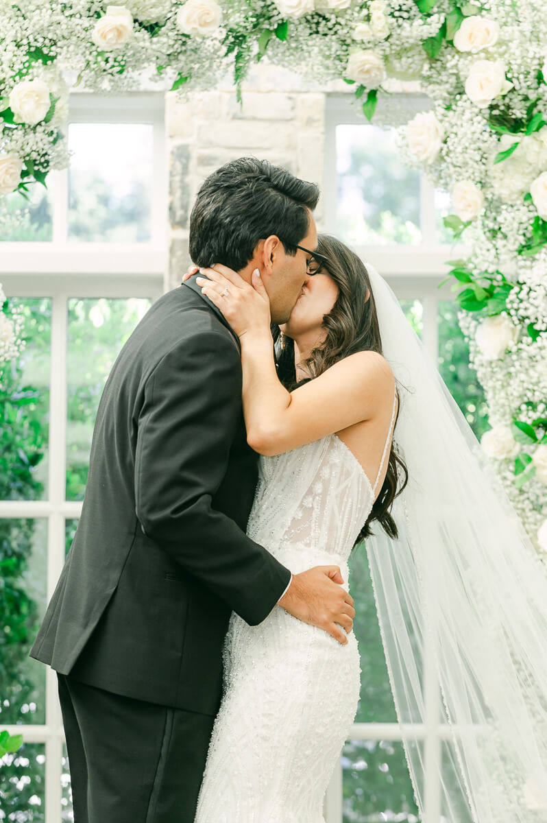 couple during their ceremony at The Peach Orchard by Houston photographer