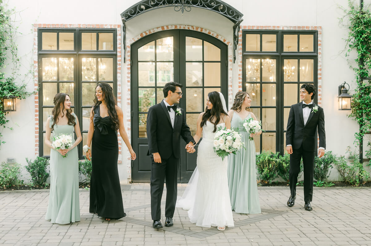 wedding party walking outside The Peach Orchard 