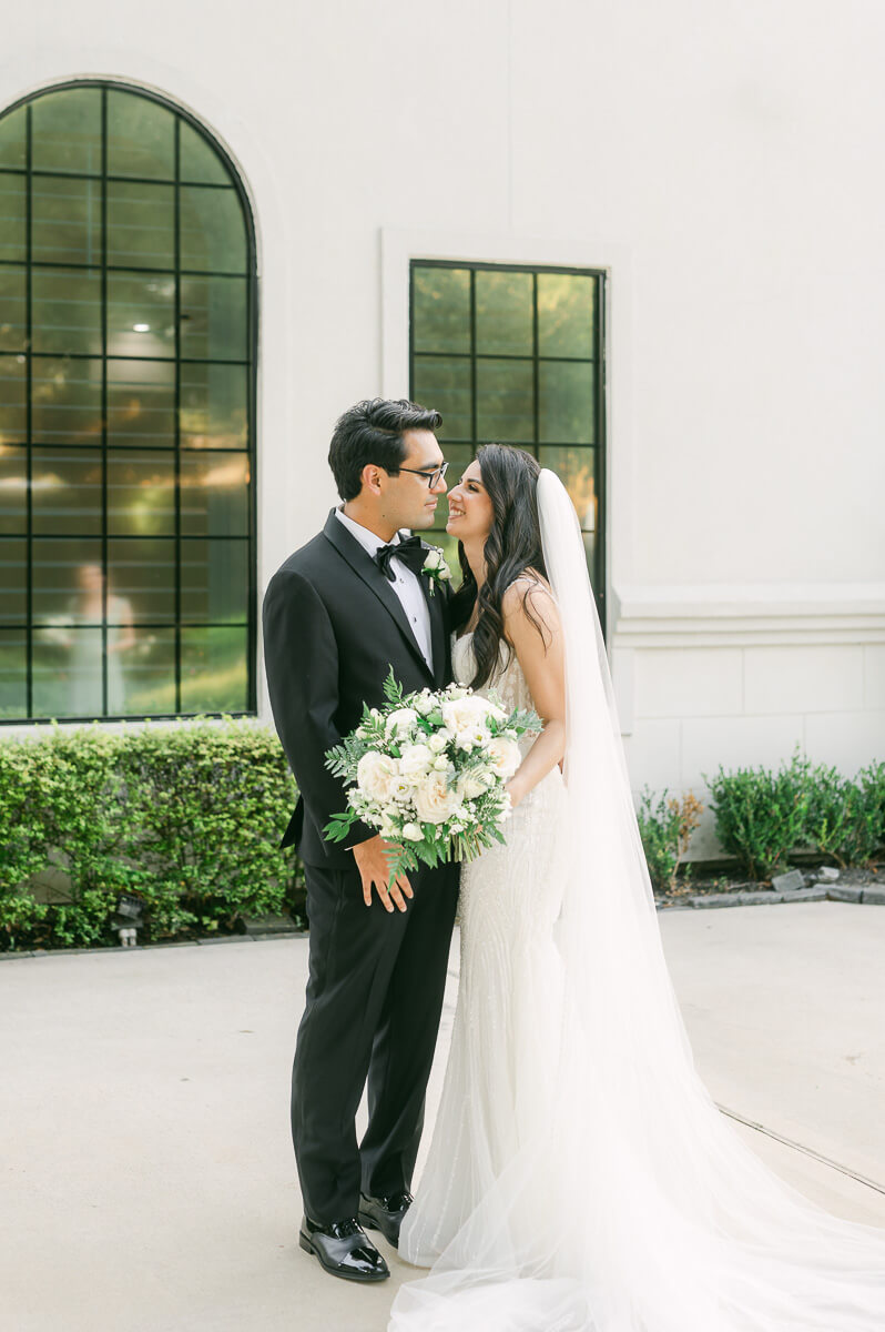 couple outside The Peach Orchard wedding venue