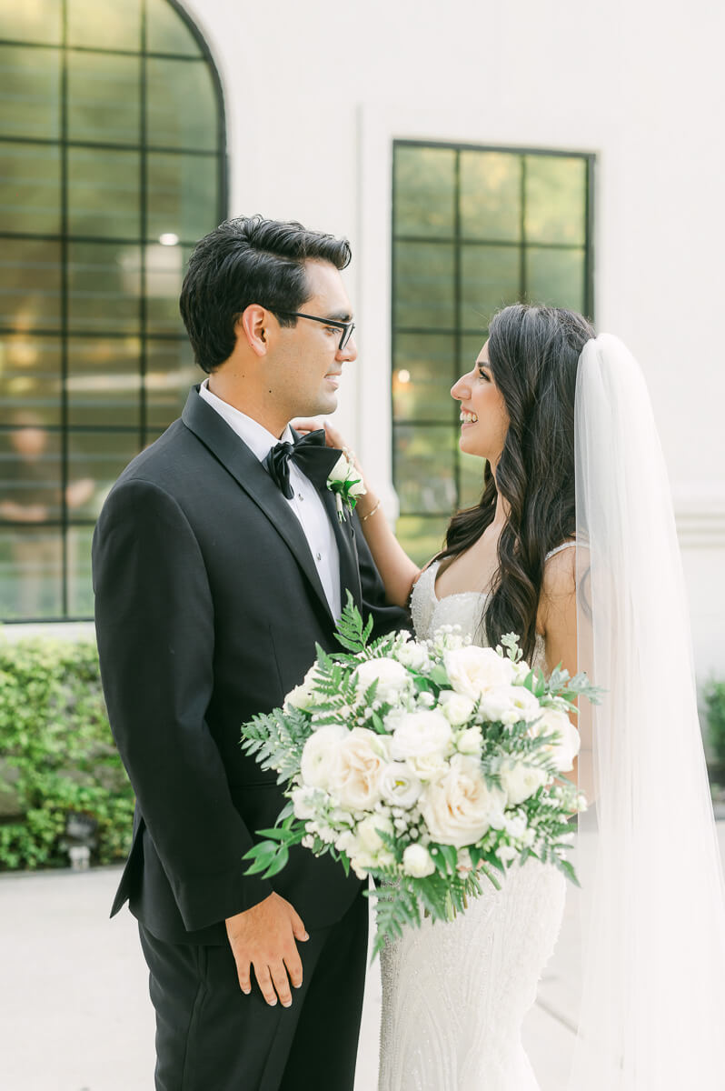 couple outside The Peach Orchard wedding venue