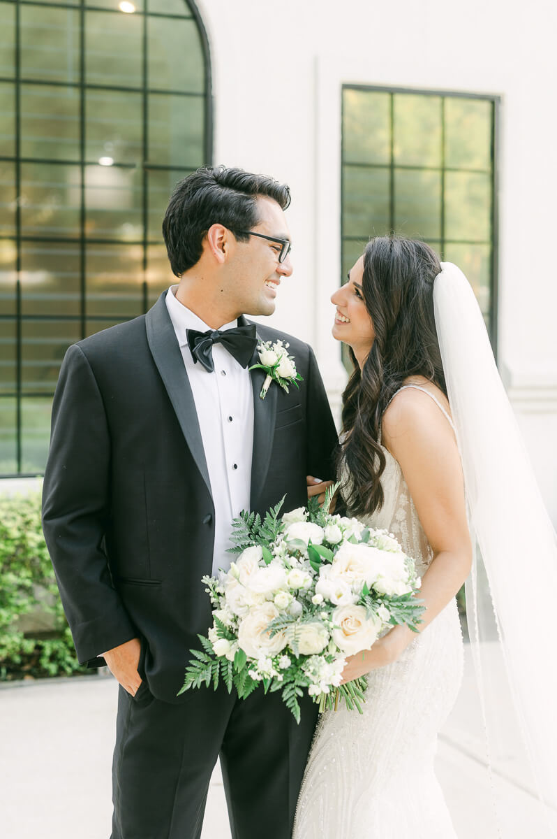 couple outside The Peach Orchard wedding venue