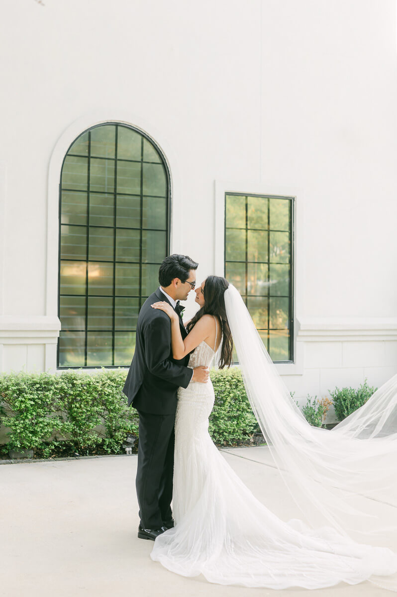 a couple in front of the peach orchard wedding venue