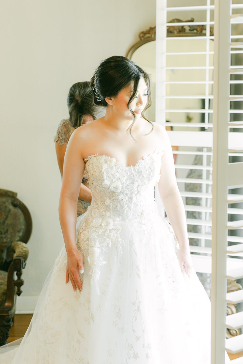 bride getting ready at cross key acres wedding venue