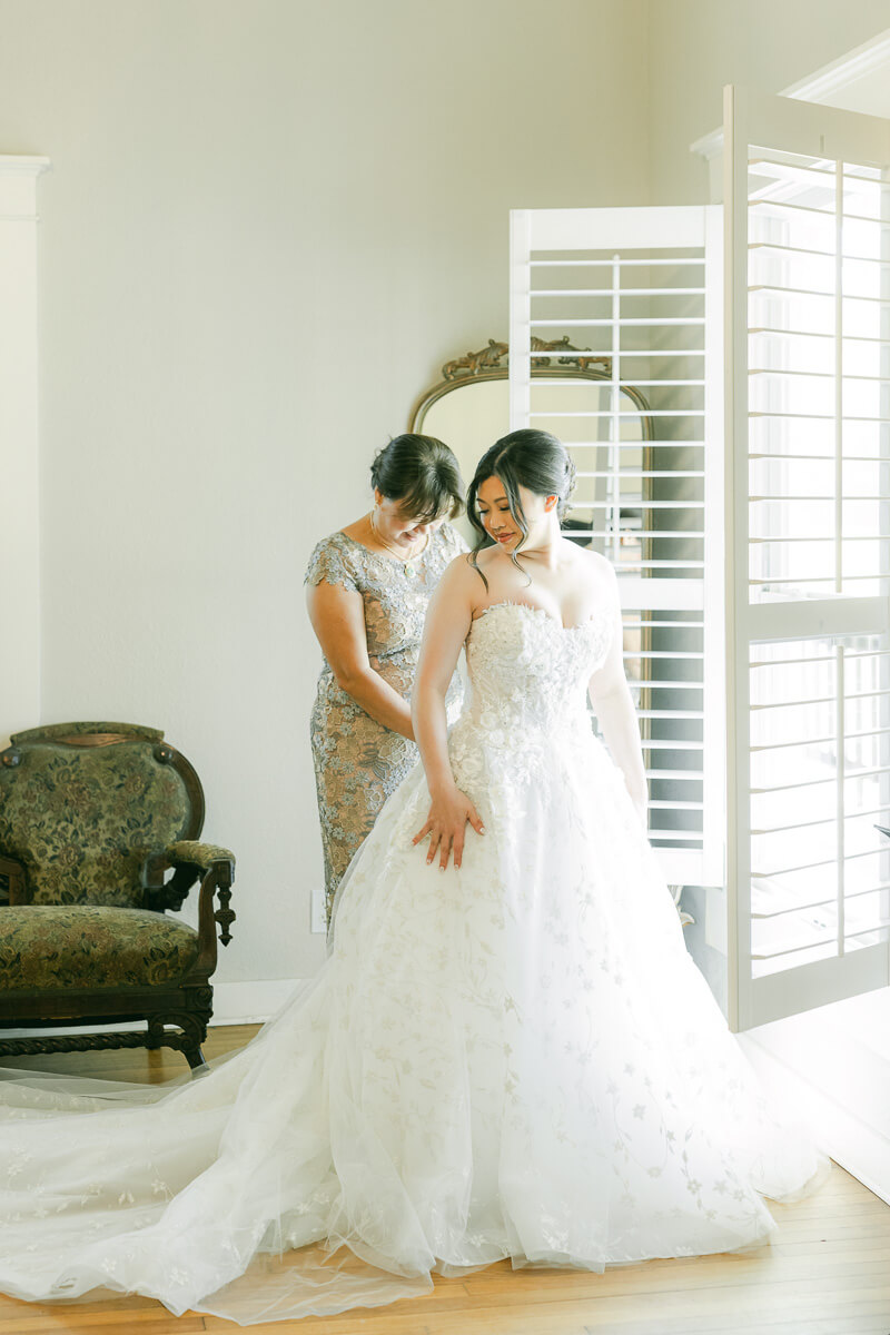 bride getting ready at cross key acres wedding venue