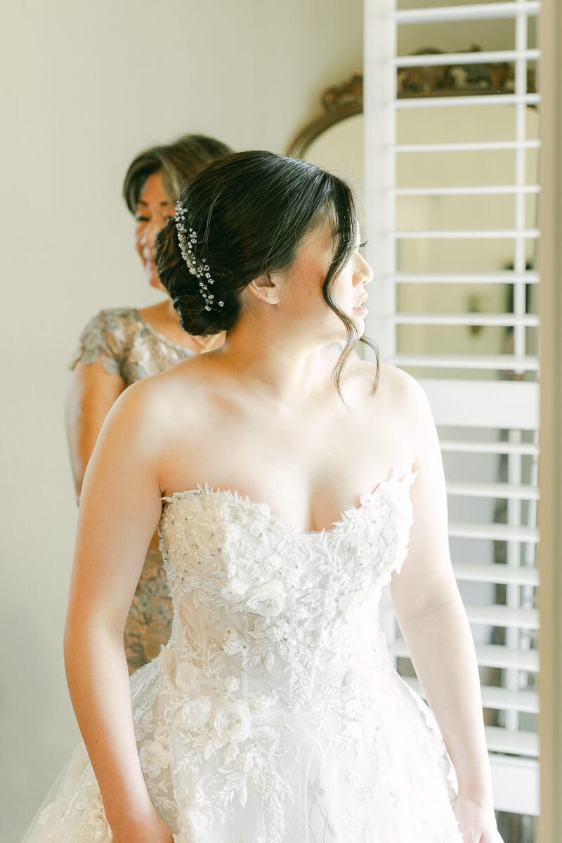 bride getting ready at cross key acres wedding venue