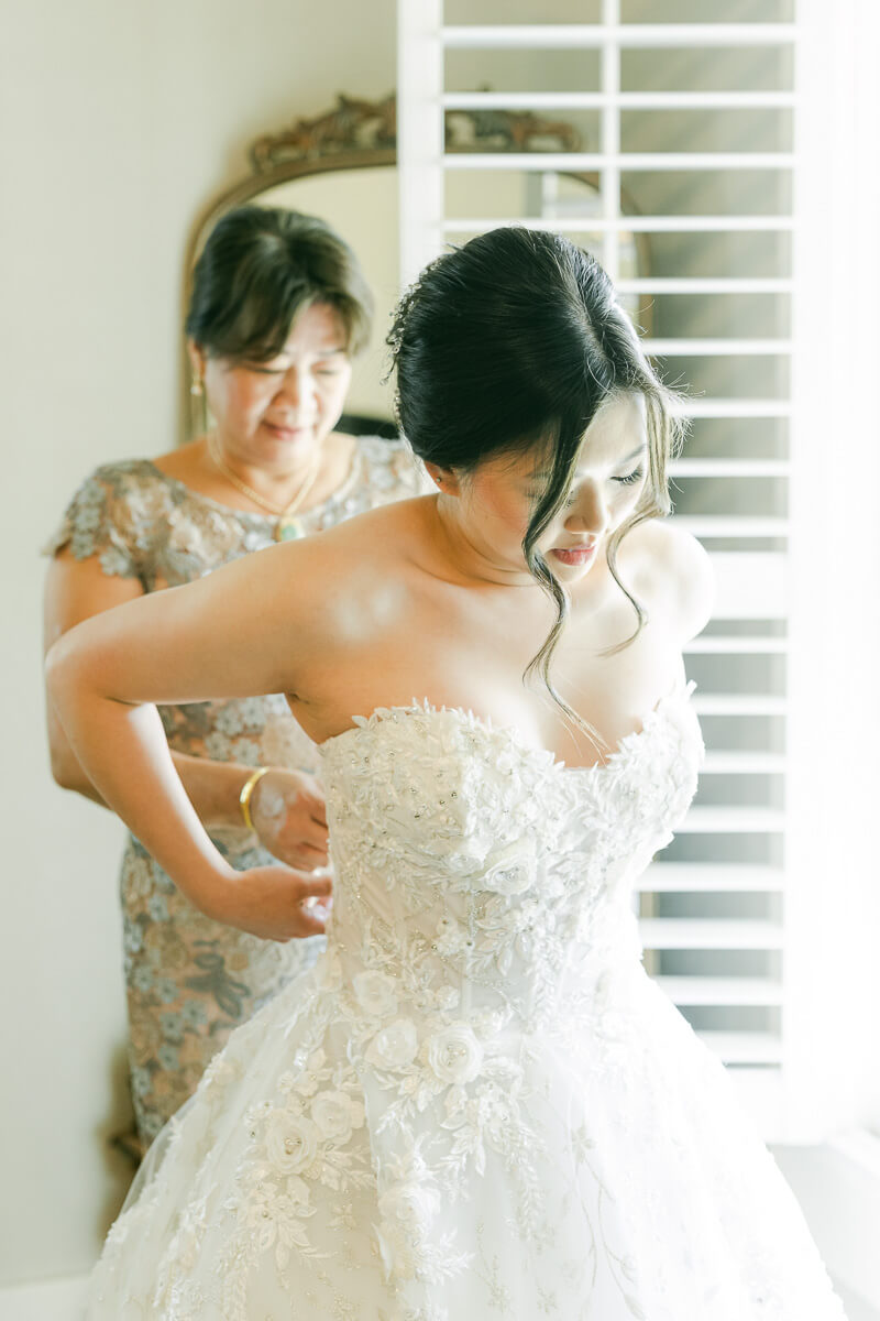 bride getting ready at cross key acres wedding venue