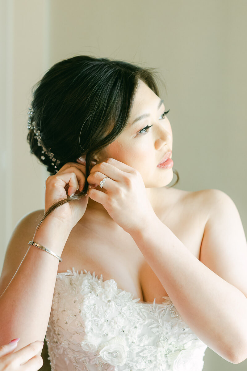 bride getting ready at cross key acres wedding venue