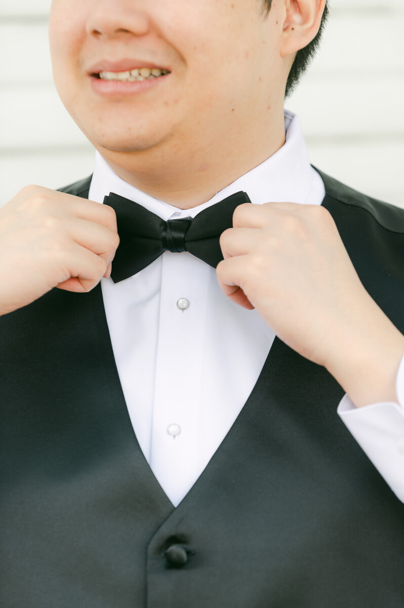 groom getting ready at cross key acres wedding venue