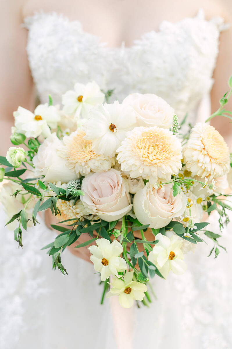 Bright floral bouquet by Houston wedding photographer