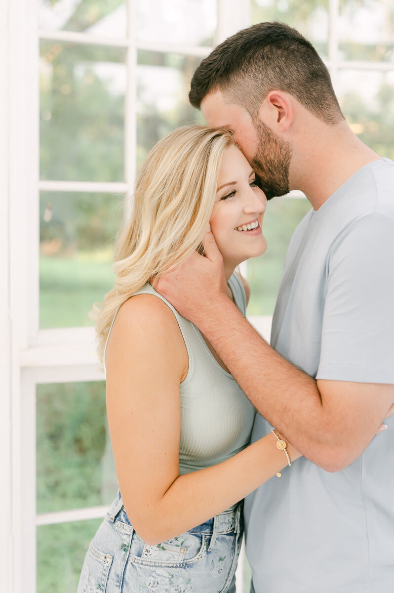 engaged couple by houston engagement photographer