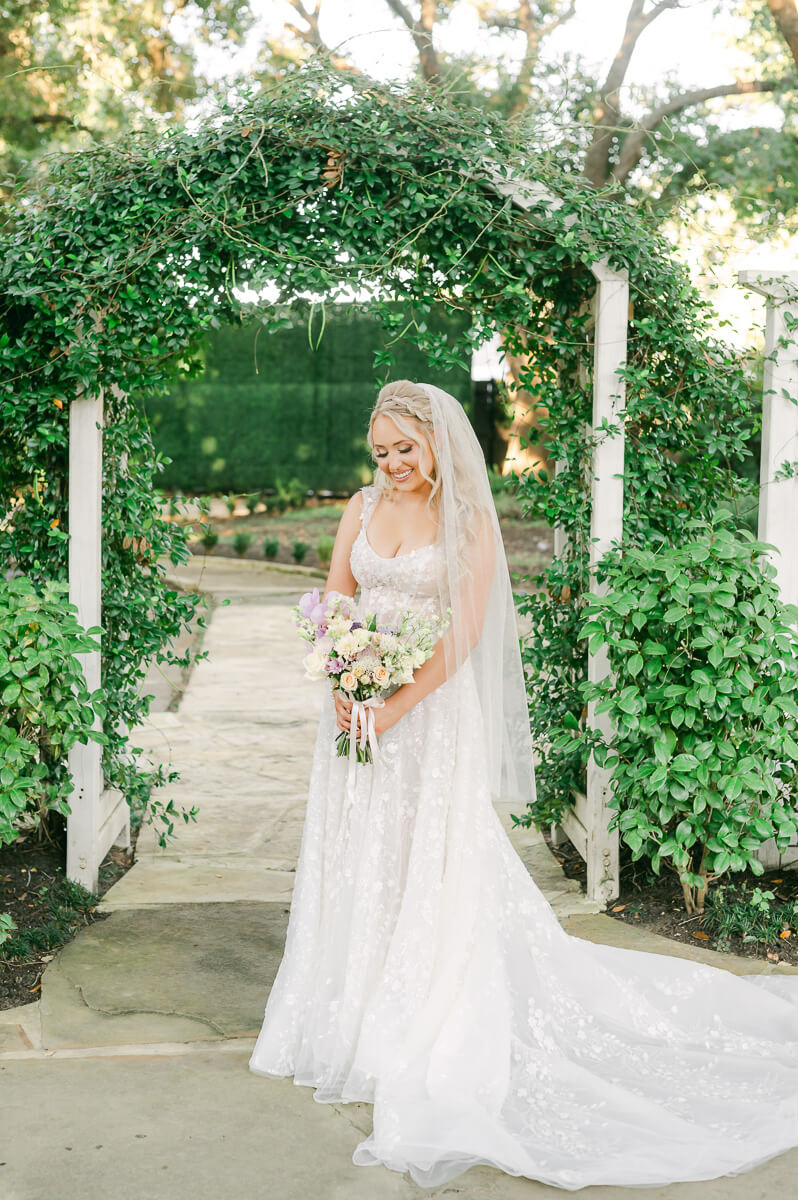 a bride at the peach orchard by houston wedding photographer Eric & Jenn Photography