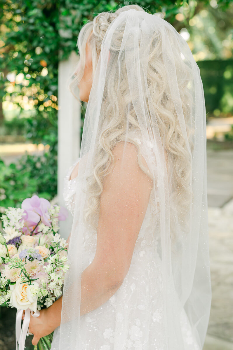 a bride at the peach orchard by houston wedding photographer Eric & Jenn Photography