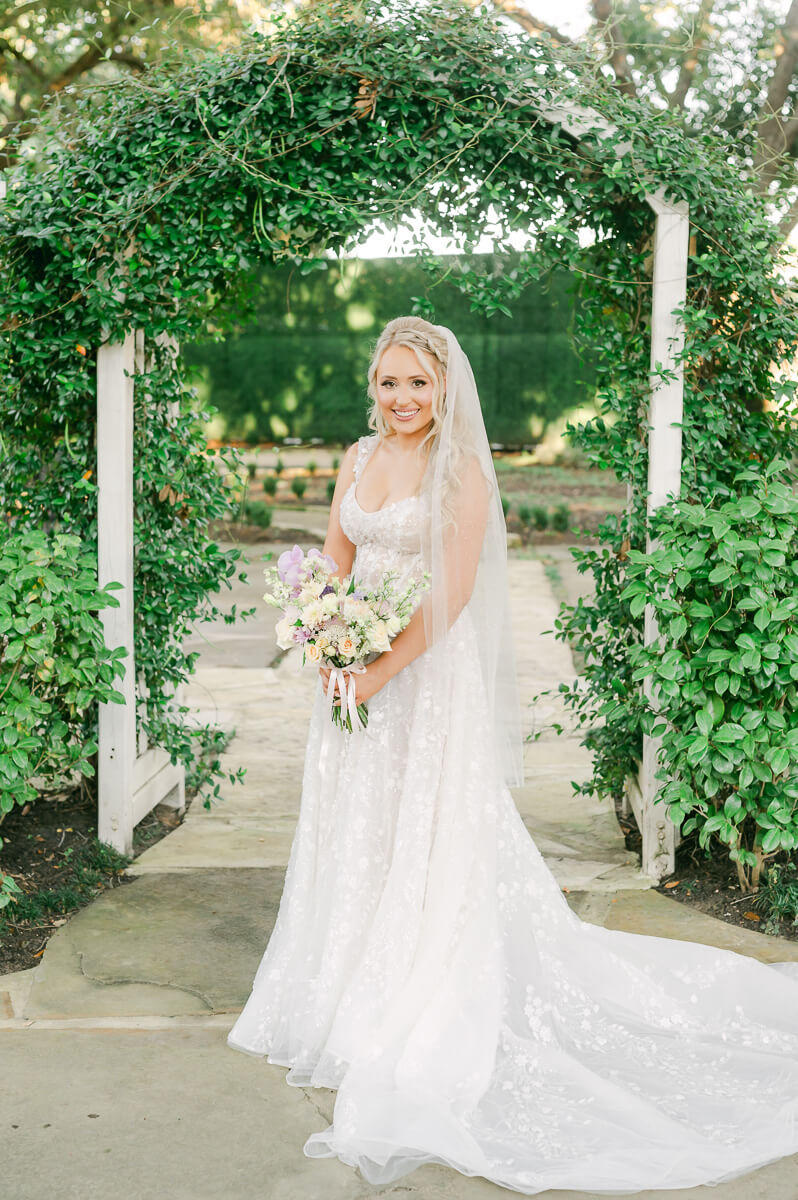 a bride at the peach orchard by houston wedding photographer Eric & Jenn Photography