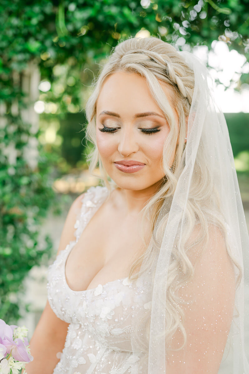 a bride at the peach orchard by houston wedding photographer Eric & Jenn Photography