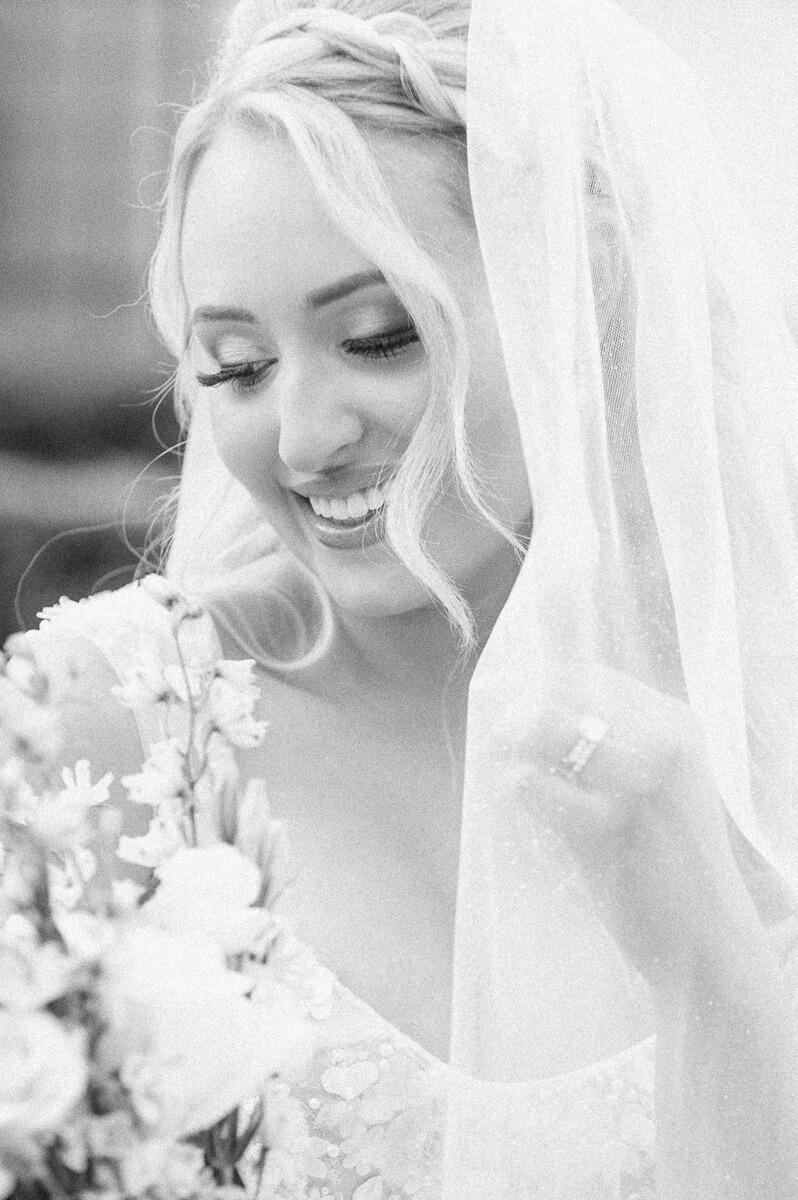 a bride outside the peach orchard wedding venue 