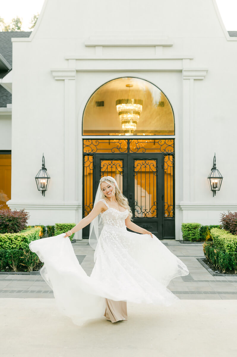 a bride dancing at the peach orchard wedding venue 