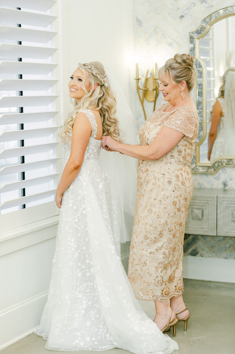 bride getting ready in the peach orchard bridal suite