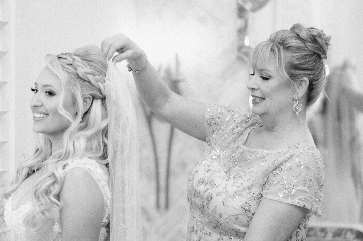 bride getting ready in the peach orchard bridal suite