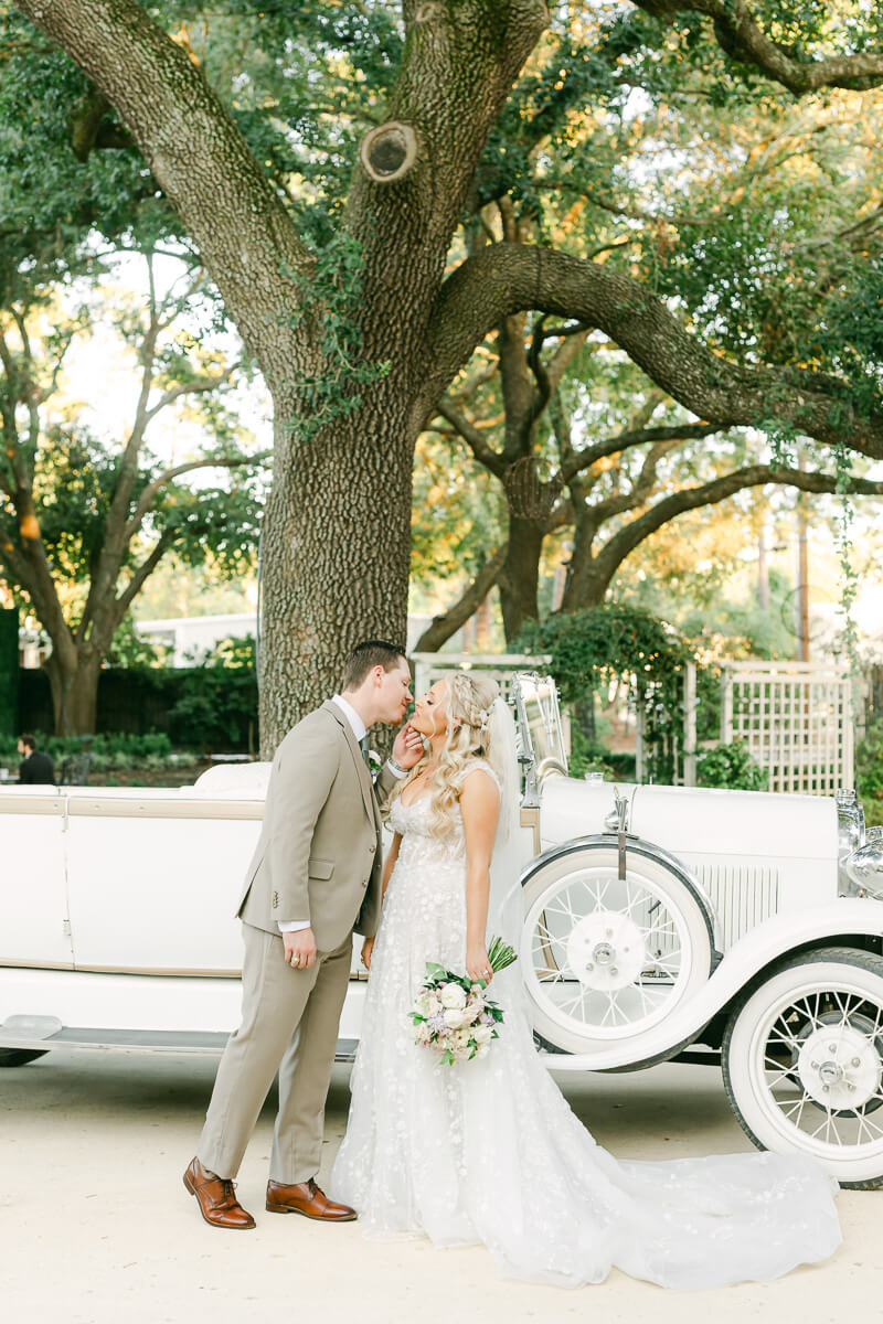 couple with a white car