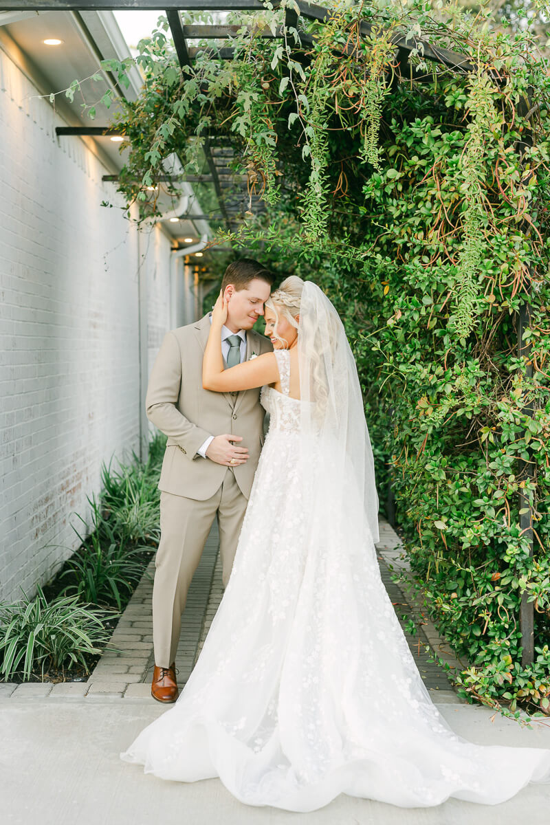 bride and groom on their wedding day by Houston wedding photographers Eric and Jenn Photography