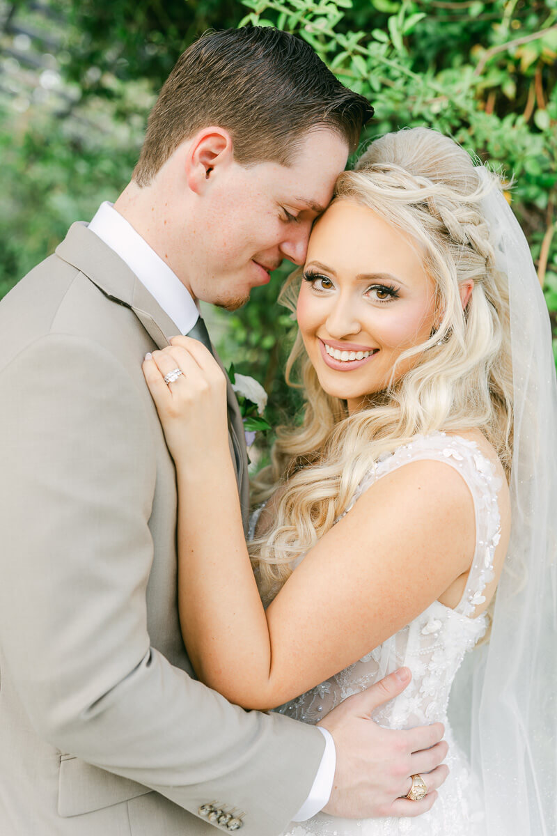 bride and groom on their wedding day by Houston wedding photographers Eric and Jenn Photography