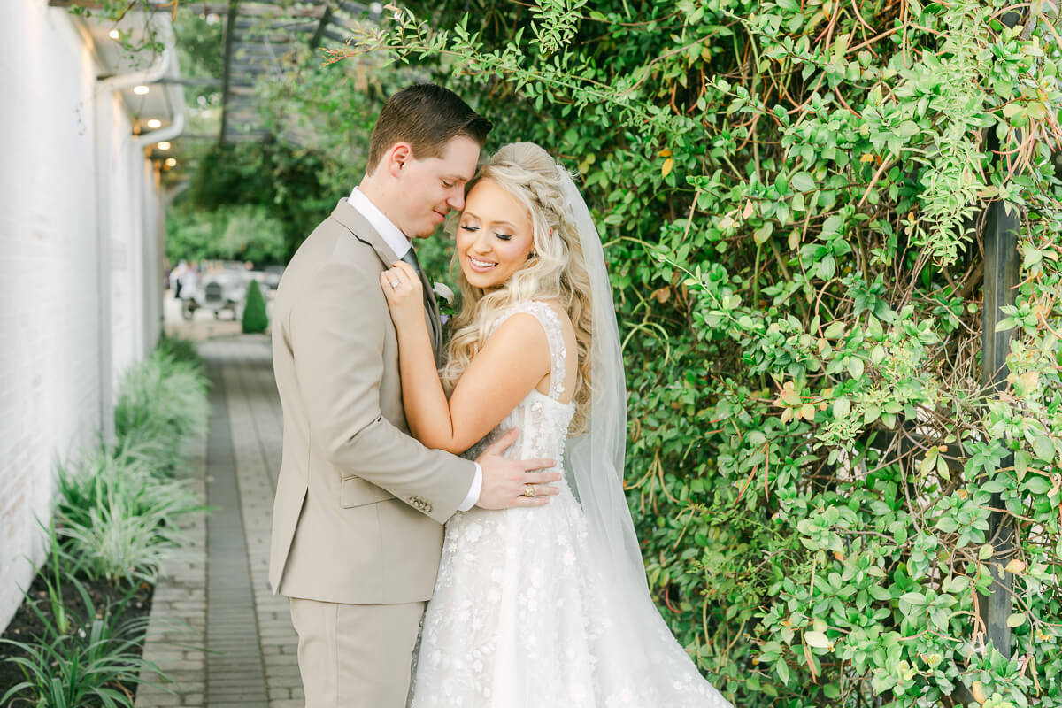 bride and groom on their wedding day by Houston wedding photographers Eric and Jenn Photography