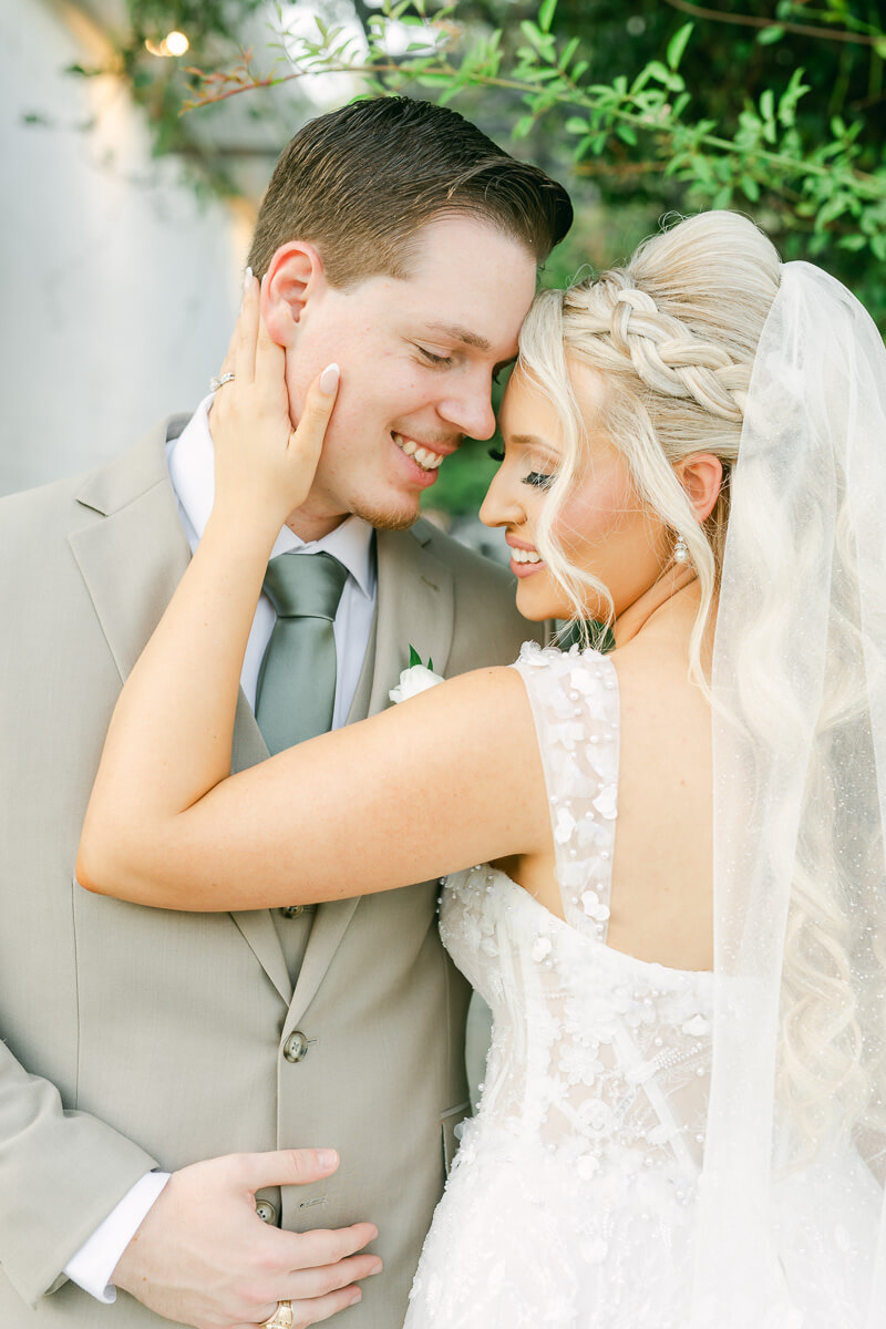 bride and groom on their wedding day by Houston wedding photographers Eric and Jenn Photography