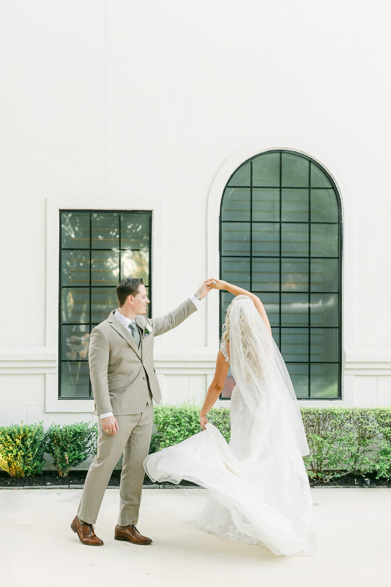 couple in front of the peach orchard wedding venue in houston