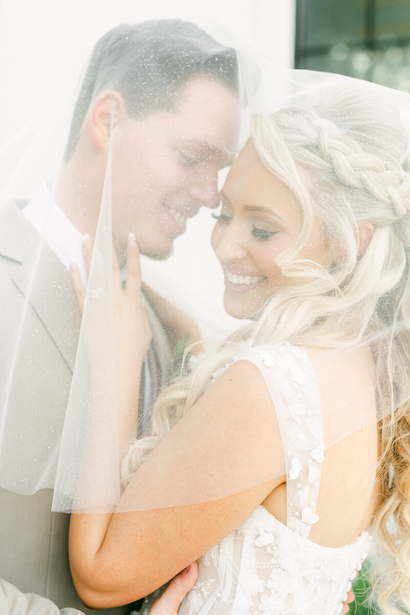 couple in front of the peach orchard wedding venue in houston