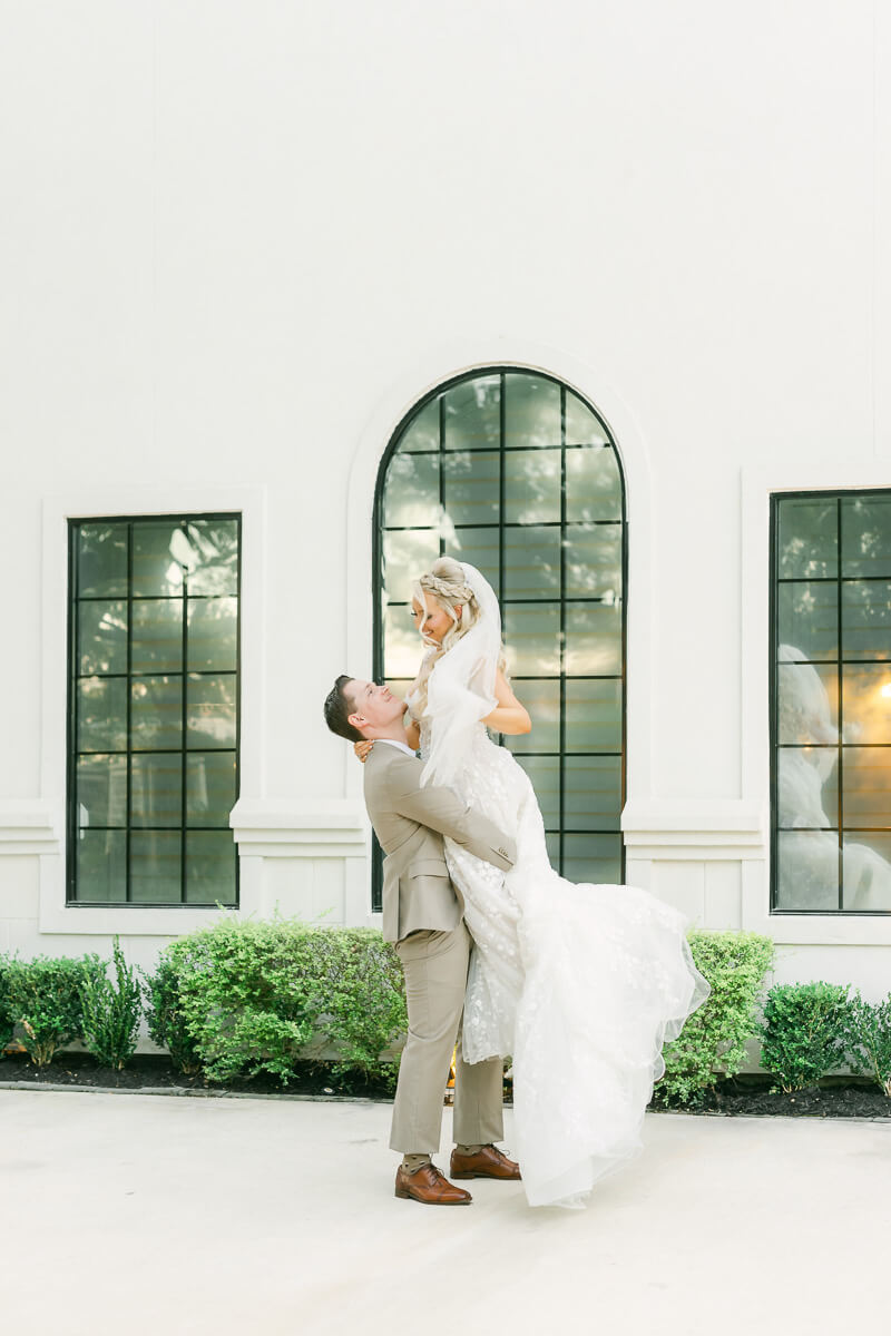 couple in front of the peach orchard wedding venue in houston