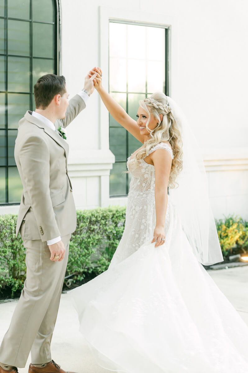 couple in front of the peach orchard wedding venue in houston