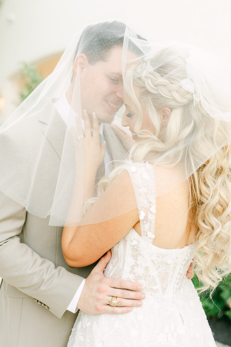 couple in front of the peach orchard wedding venue in houston