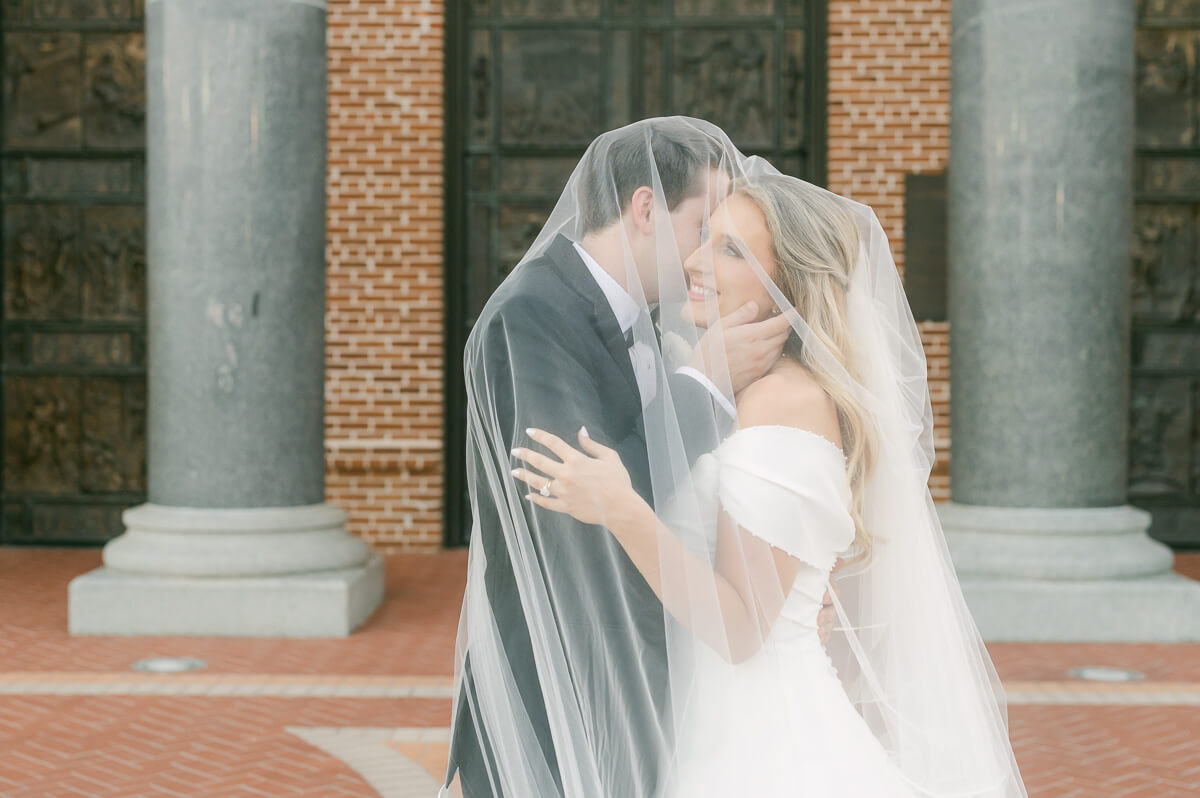 bride and groom posing for beaumont wedding photographer