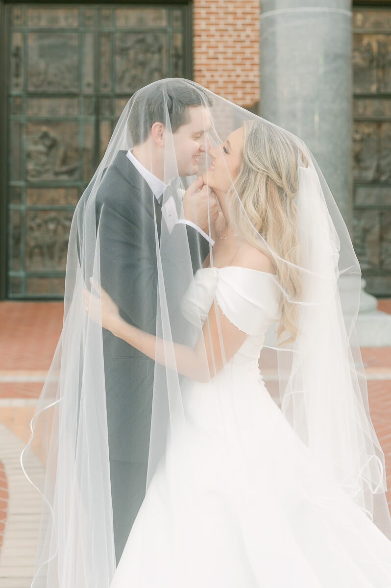 bride and groom posing for beaumont wedding photographer