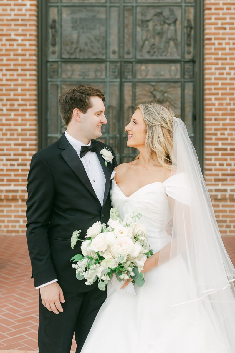 bride and groom posing for beaumont wedding photographer