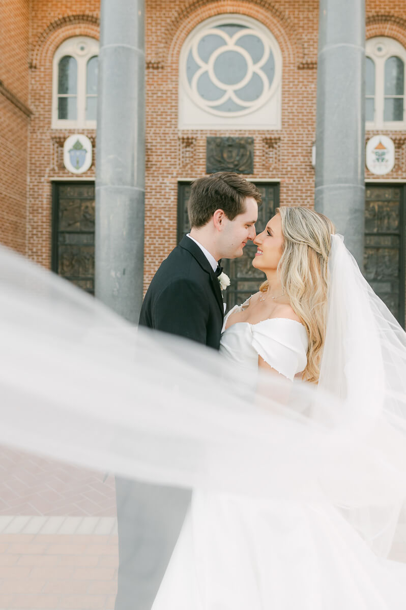 bride and groom posing for beaumont wedding photographer